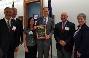 R to L: Milton Magnus, III, H Woltz, Amy DeArmond, Senator Ron Wyden, Robert McKinzie, Kimberly Korbel